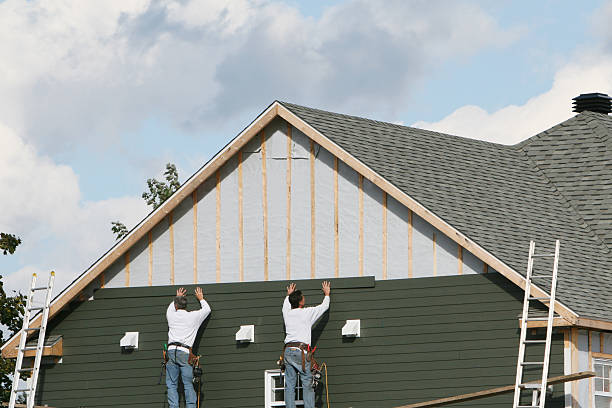 Professional Vinyl Siding technician working in East Boston, MA